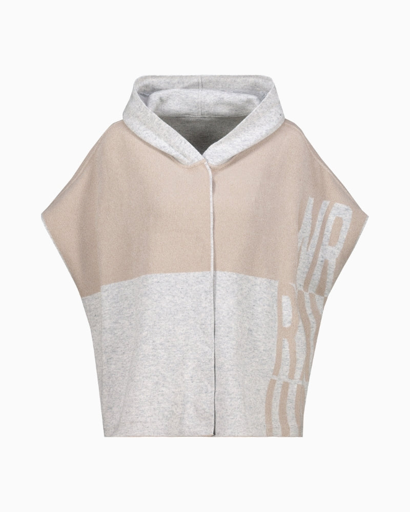 Front view of wool blend cape in tonal grey panels