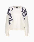 White Monari knitted jumper with bold printed lettering on the front
