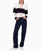 Woman wearing Monari knitted jumper with intarsia pattern styled casually – Áines Boutique