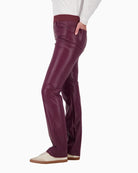 Side view of sleek leather-look fabric and side pocket detail