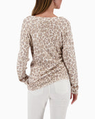 Back view of Monari Leo jumper in neutral beige