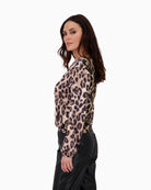 Side view of blouse with slight high-low hem