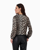 Back view of leopard zip-up cardigan showing soft viscose texture