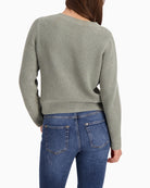 Back view of soft shimmer jumper in neutral tone with round neck