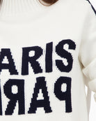 Close-up of decorative buttons on Monari cotton-blend jumper