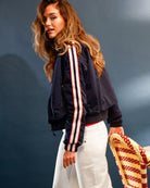 Woman wearing Monari nylon jacket navy styled casually – Áines Boutique