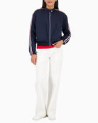 Woman wearing Monari nylon jacket navy styled casually – Áines Boutique