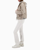 Side view of quilted jacket showing clean fit and structure