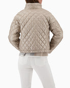Back view of lightweight padded jacket with quilted panels