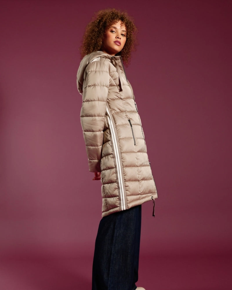 Model wearing Monari quilted coat showing regular fit and long sleeves
