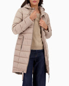 Close-up of Lurex stripe and Monari logo patch on sleeve of quilted coat