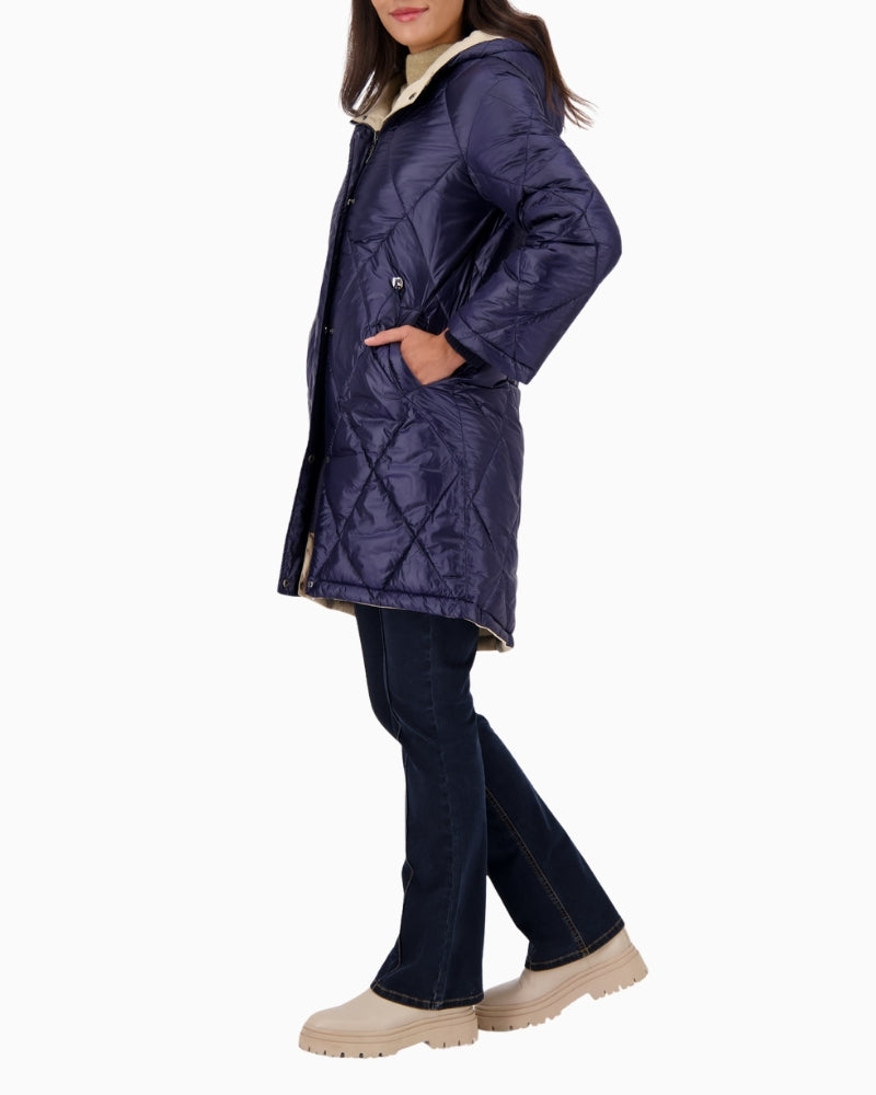 Side profile of Monari coat with hood and practical pocket design