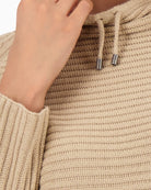 Close-up of ribbed detailing on Monari cotton-acrylic beige sweater
