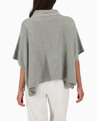 Back view of elegant cotton blend cape with subtle shimmer