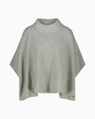 Front view of sparkly cape with stand-up collar and ¾ sleeves