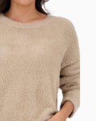 Close-up of soft cotton blend knit in olive green