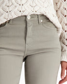 Close-up of stretch denim texture and crease detail