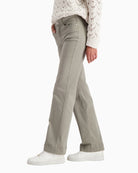 Side view of straight-leg cotton jeans with structured fit