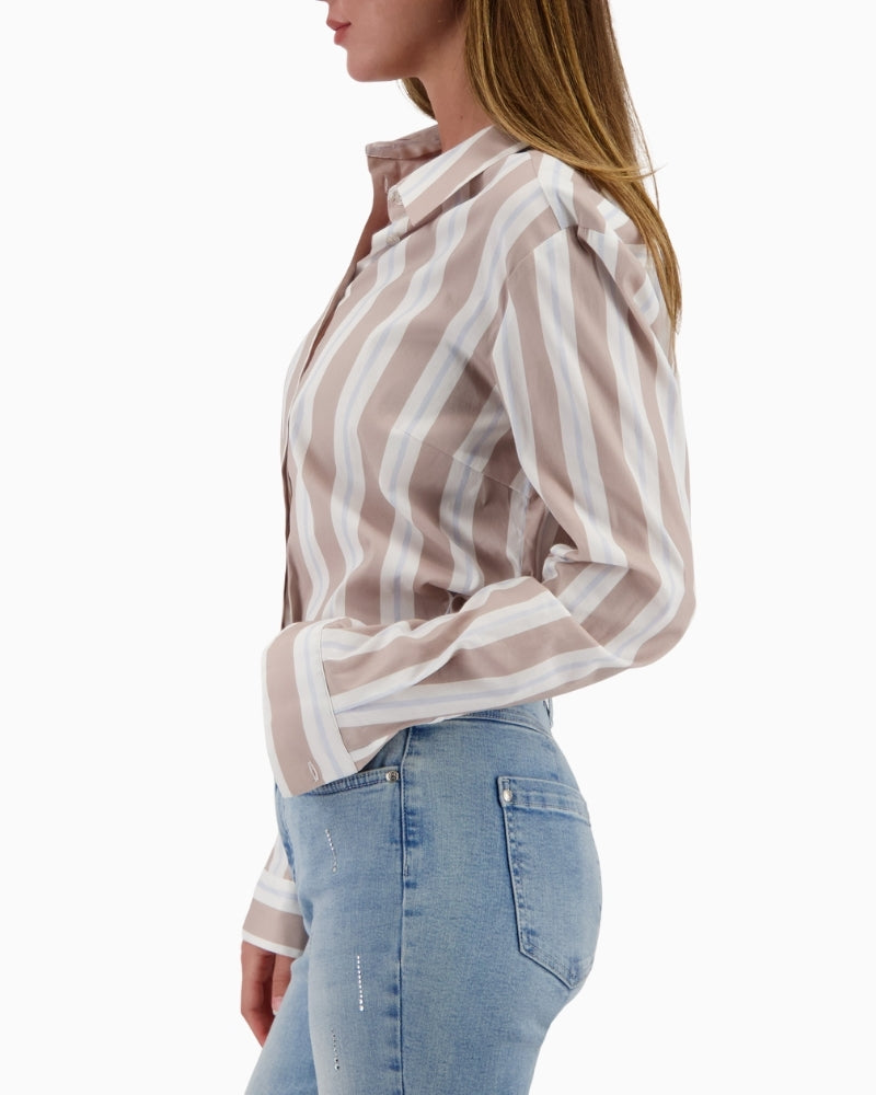 Side view of striped blouse showing cuffed sleeves and fit