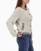 Side view of elegant Monari jacket showing subtle metallic threads