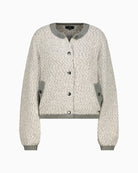 Front view of cotton tweed jacket with button placket and round neck