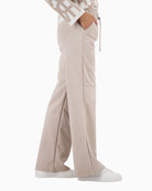 Side view of Monari velour trousers in neutral beige