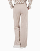 Back view of straight-leg velour trousers with soft drape
