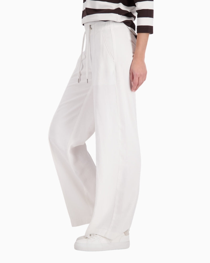 Monari wide leg drawstring trousers lightweight denim-look, woman wearing side view – Áines Boutique