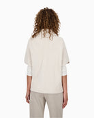 Back view showing relaxed fit and fluid drape