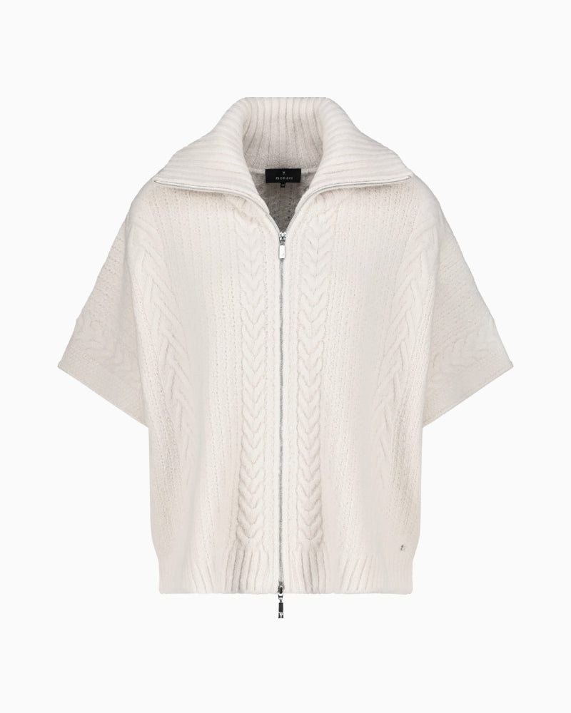 Front view of open-front knitted cape in soft beige