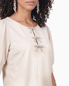 Monari Bow Detail Sweatshirt in Cream close-up of decorative bow