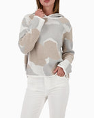 Monari knit sweater with cloud pattern front view on woman wearing it – Áines Boutique