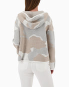 Monari knit sweater with cloud pattern back view on woman wearing it – Áines Boutique