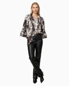 Monari Flared Faux Leather Trousers in Black styled view