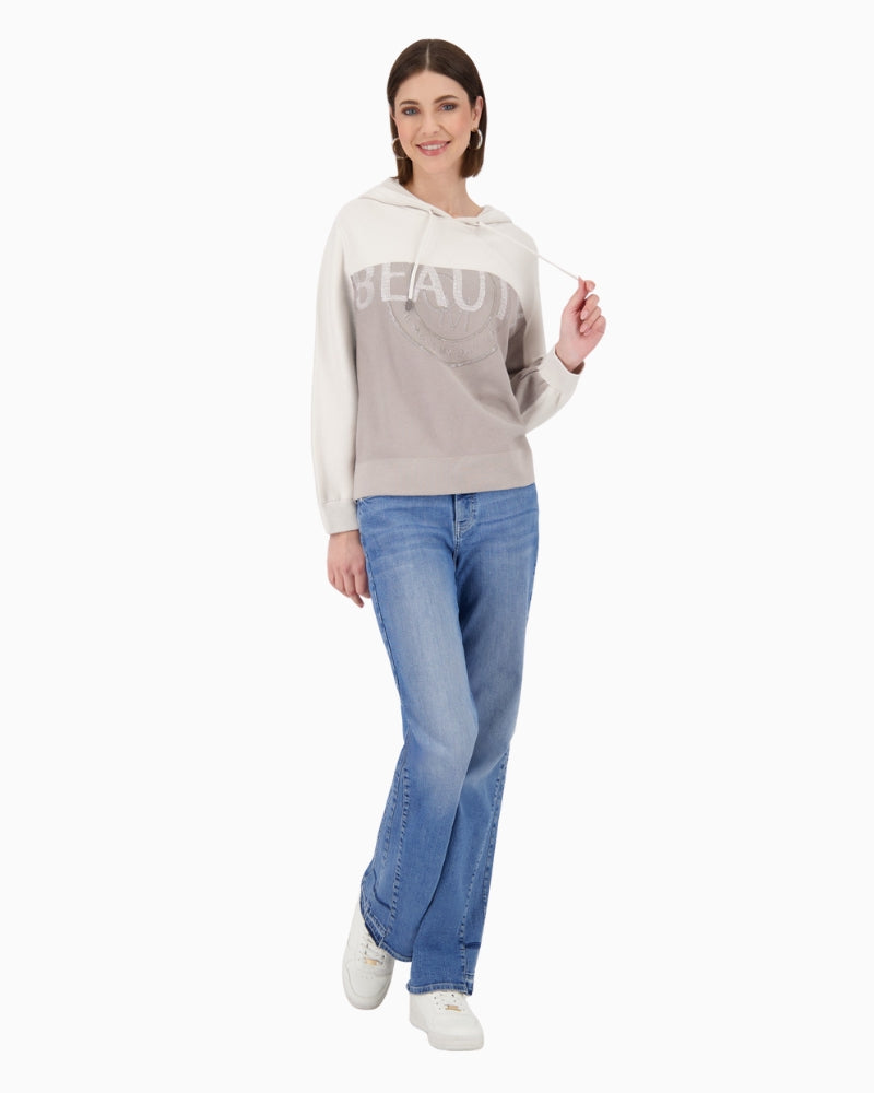 Styled with casual trousers for a relaxed daytime look