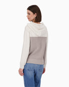 Back view of hooded jumper in tonal grey cotton