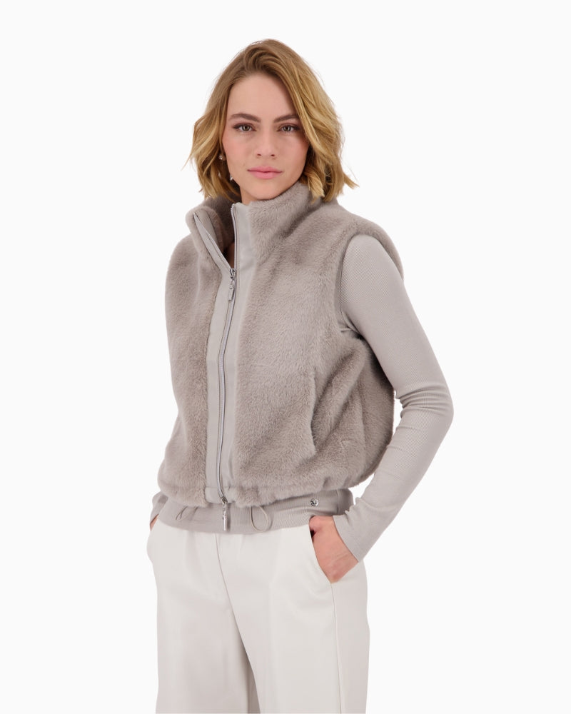 Front view of grey Monari faux fur gilet with stand-up collar and zip