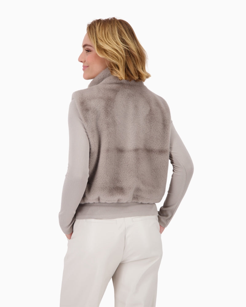Back view of Monari gilet with subtle shaping and stretch hem