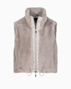 Detail shot of high stand-up collar and soft faux fur texture