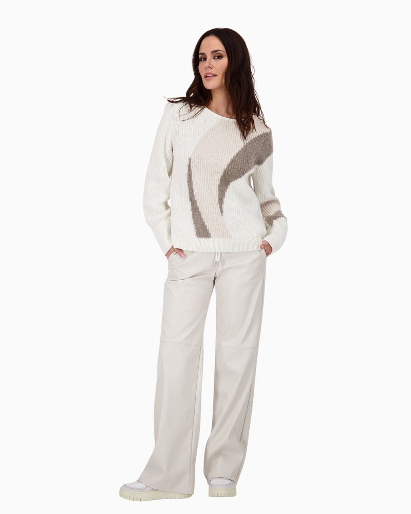 Model wearing Monari knit with casual trousers