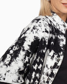 Monari Jacquard Knit Cape in black and white button placket detail