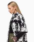 Monari Jacquard Knit Cape in black and white jacquard pattern detail