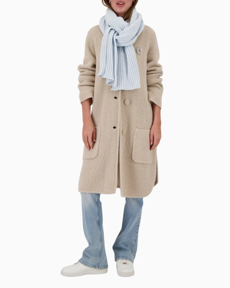 Monari knitted chenille scarf draped on model – Áines Boutique