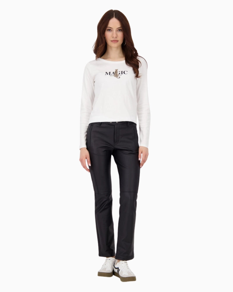 Model styled with black trousers paired with long sleeve top