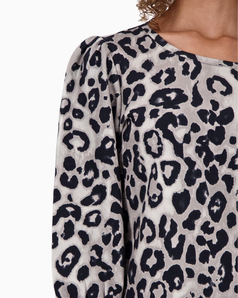 Close-up of puff shoulder and leopard pattern