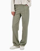 Monari pants with lettering band front view on woman wearing them – Áines Boutique