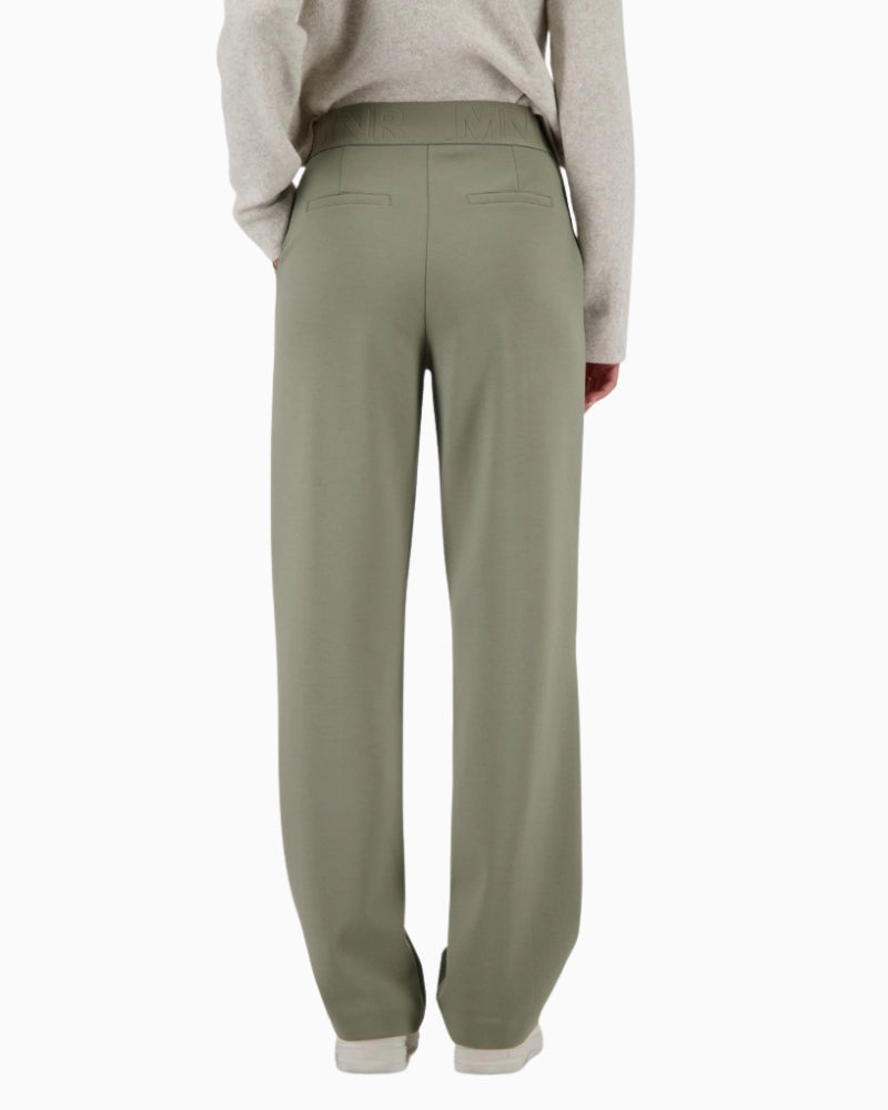 Monari pants with lettering band back view on woman wearing them – Áines Boutique