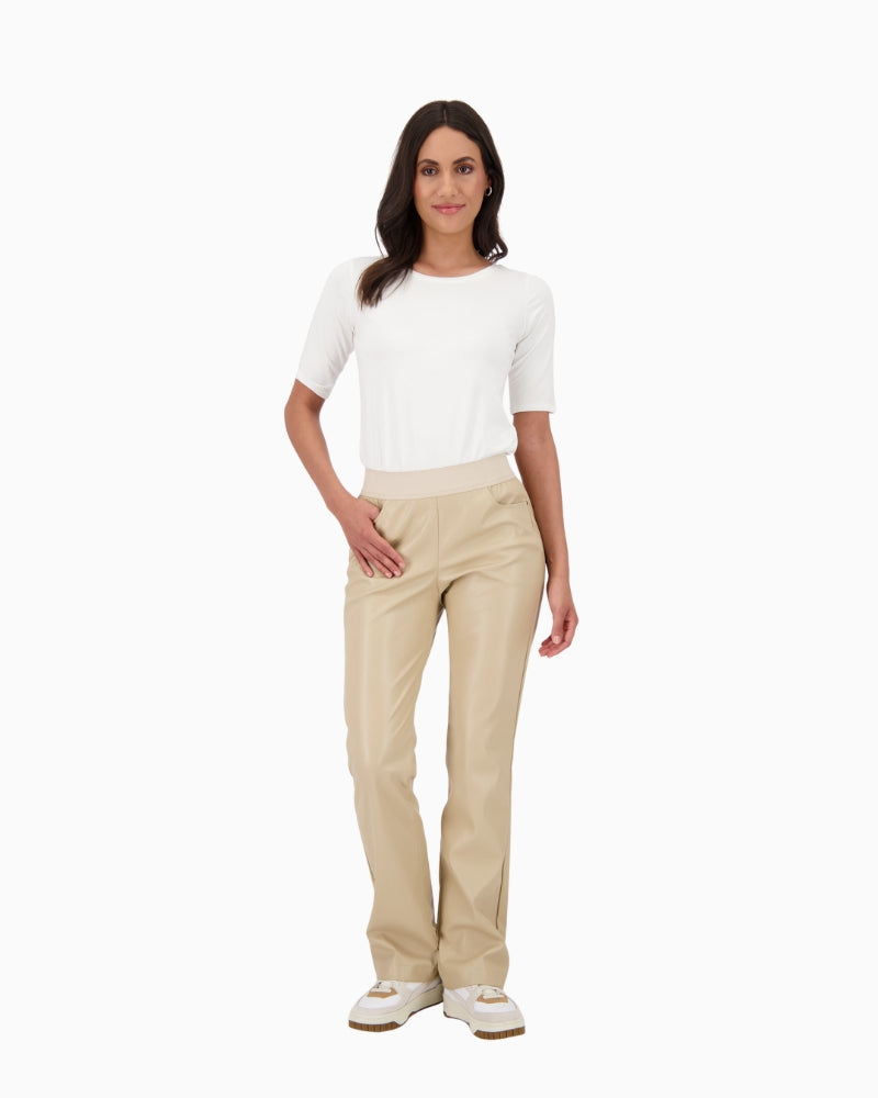 Soft beige leather-look trousers with sleek finish