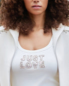 Woman wearing Monari Top With Jewelry Detail front view – Áines Boutique