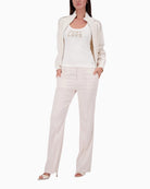 Woman wearing Monari Top With Jewelry Detail front view full length – Áines Boutique